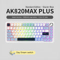 Black, grey and yellow wireless mechanical keyboard with hot-swap switches and included tools on a desk.