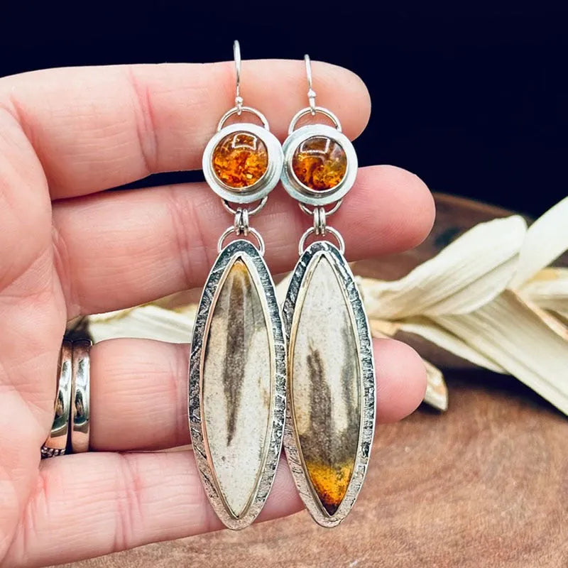 Coloured glaze electroplated metal earrings for women, silver colour, one pair shown on white background