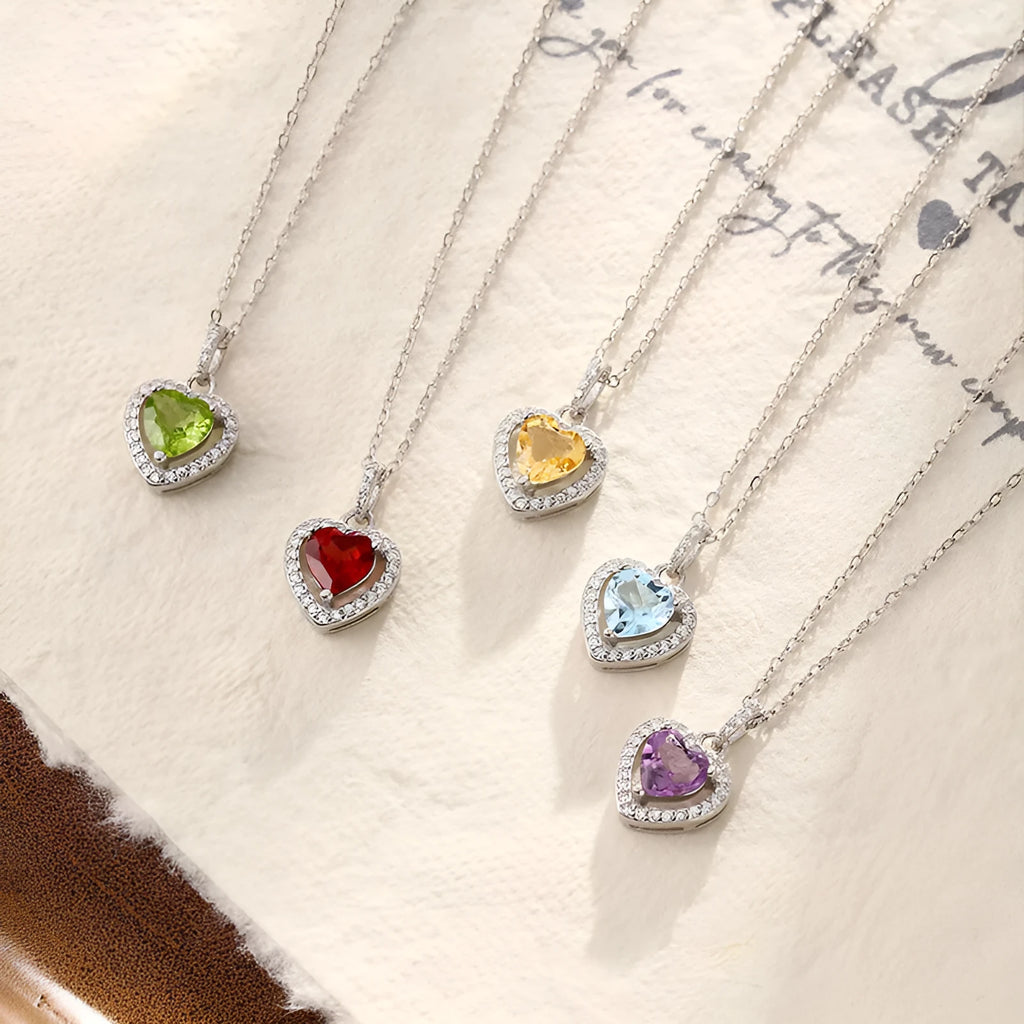 Women's sterling silver heart pendant necklace with natural gemstone on cross chain