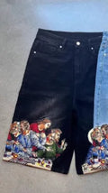 Blue men's tapered cotton shorts with a Jesus print design on the back pocket.