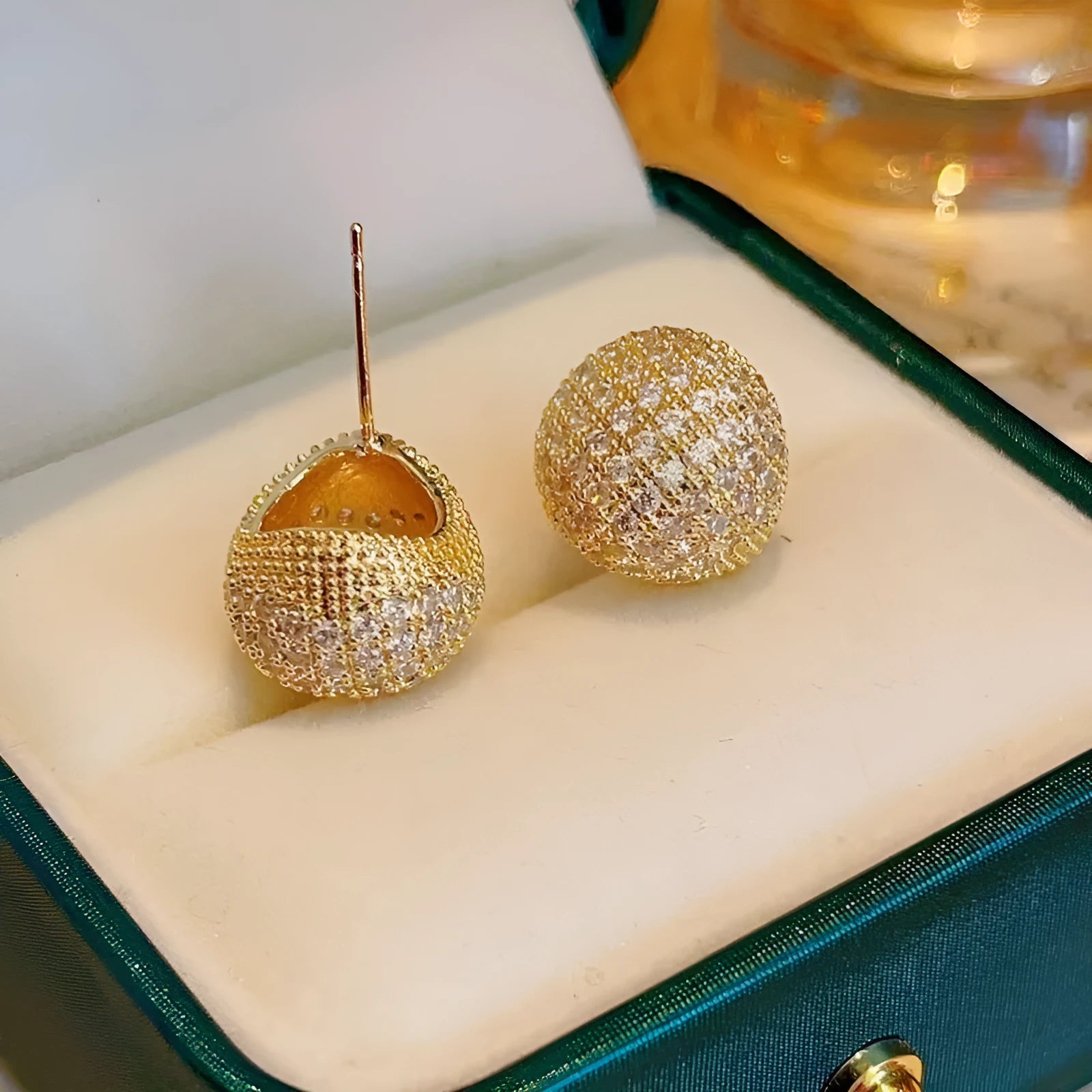 Geometric drop earrings with golden bean clusters and flash diamond accents in gold and white colour options