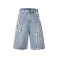 Men's distressed denim shorts with raw edge detailing in straight cut hip hop style