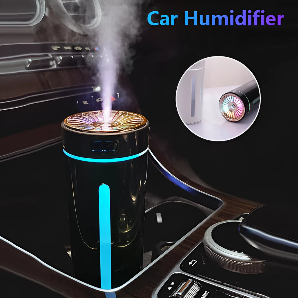 Black portable USB humidifier with colourful lights on car dashboard