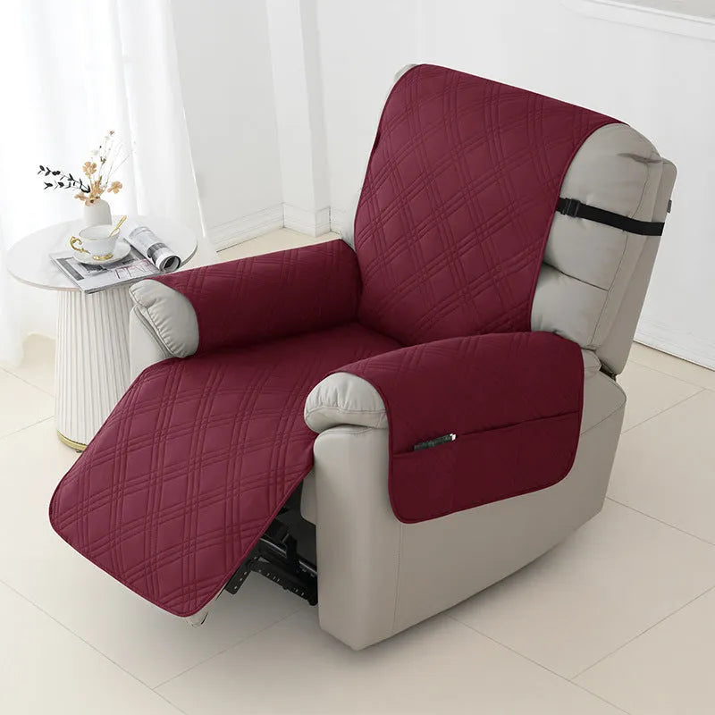 Quilted waterproof sofa cover fitted on a Chivas massage chair, shown in peacock blue colour.