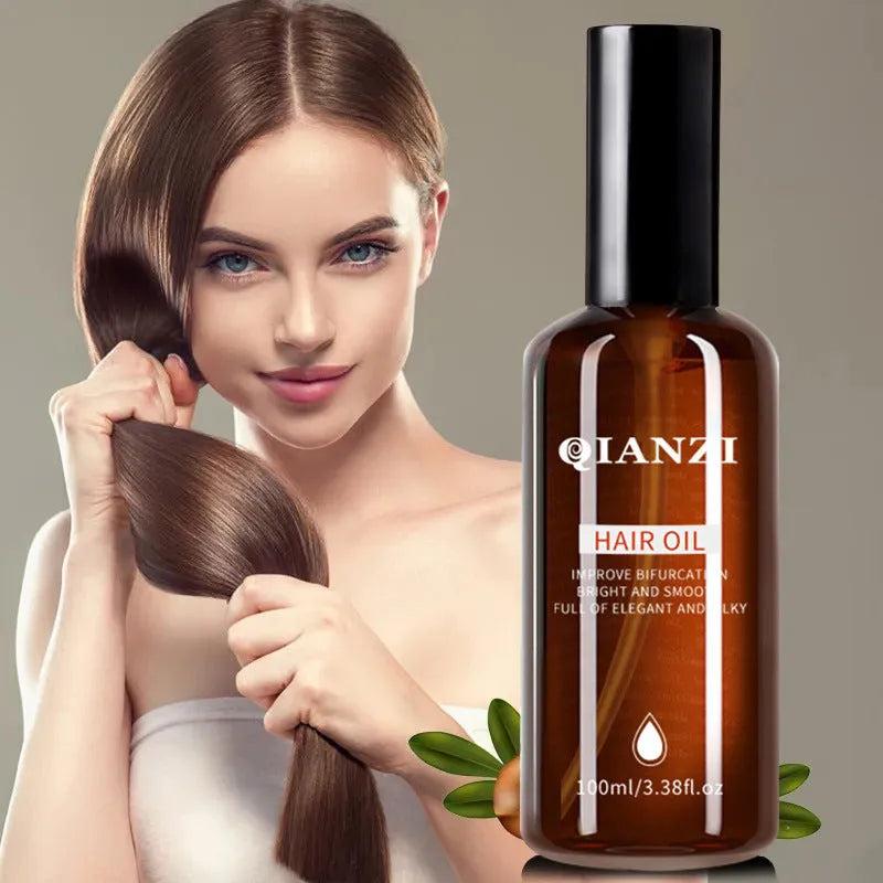Clinique Essence Brightening Hair Conditioning Oil 100ml bottle with grapeseed, macadamia, argan, and jojoba oils