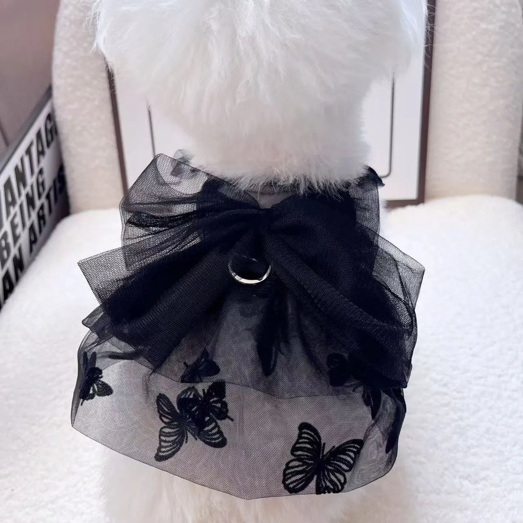 Black tulle princess skirt pet costume on small dog with size chart showing five available sizes
