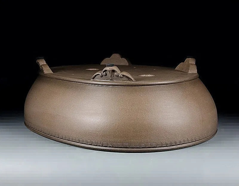 Handmade oval purple sand flowerpot in black mud green colour measuring 50cm long