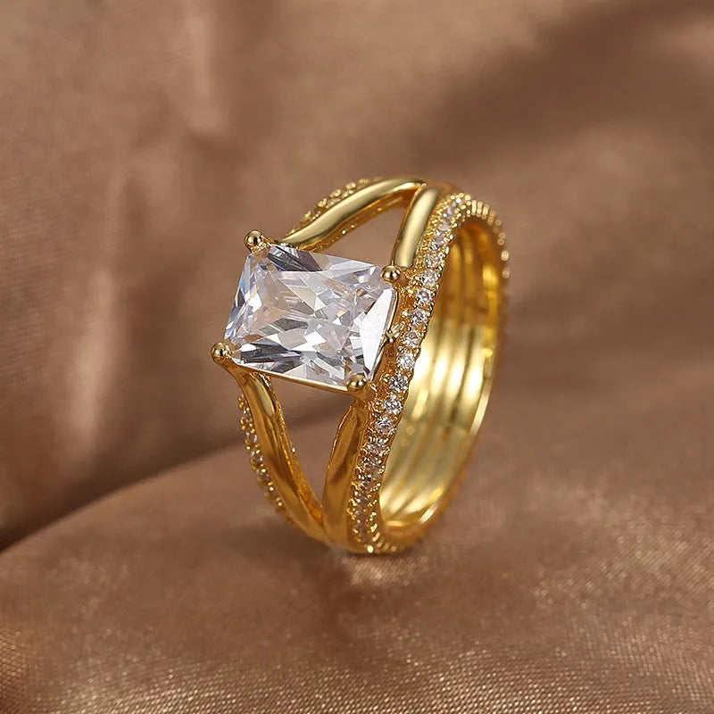 Gold geometric women's ring with square zircon stone shown in European simple luxury design