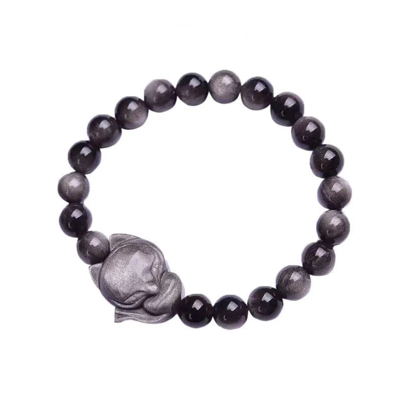 Obsidian fox charm bracelet for women showing a single black polished 8mm stone carved into a fox design.