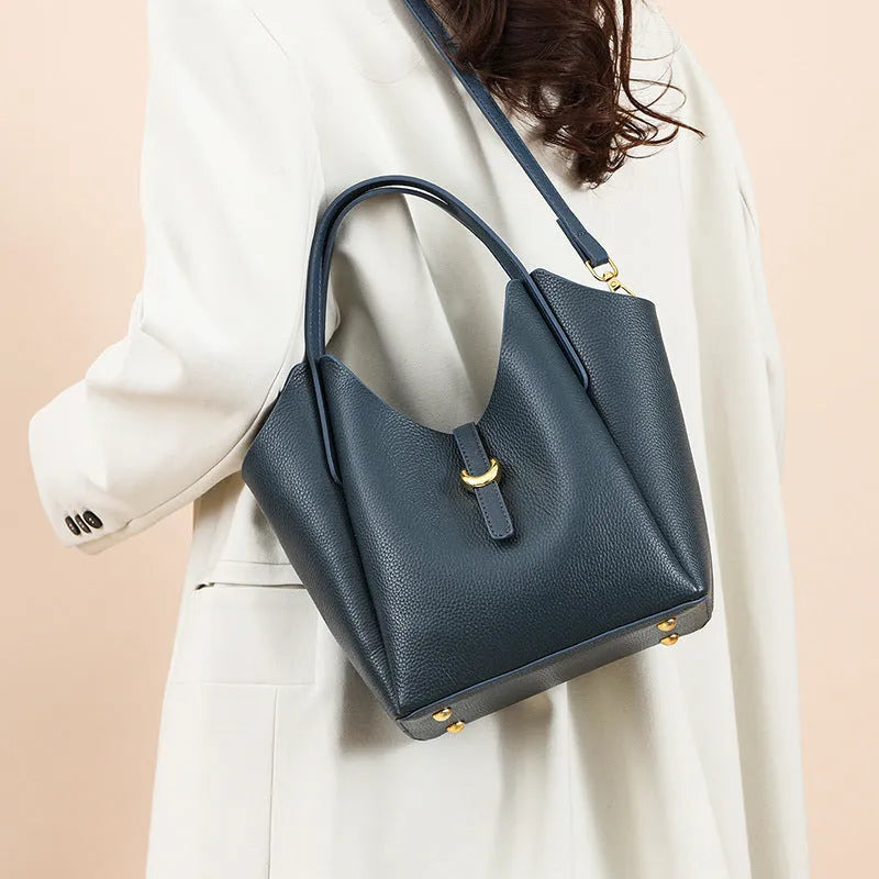 Genuine leather women's large capacity hand holding bucket bag in retro style.