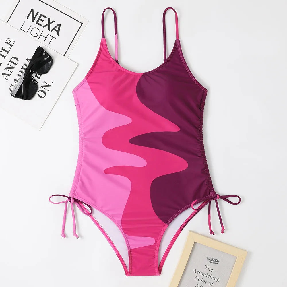 Women's sleeveless one-piece swimsuit with fixed swimming trunks in blue colour