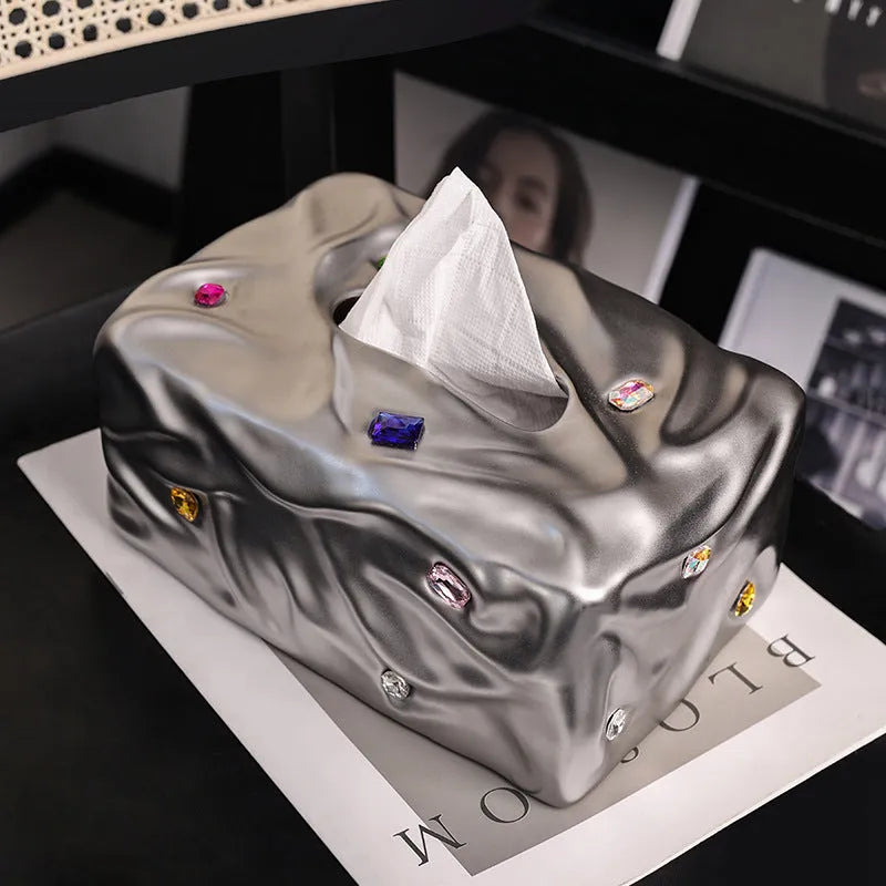 Ceramic tissue box in matte white or silver luxury finish for home decor.