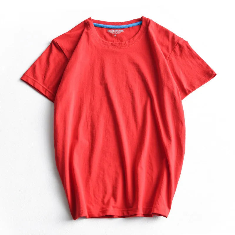 Men's solid colour round neck cotton T-shirt on a hanger, showing short sleeve and casual pullover style.