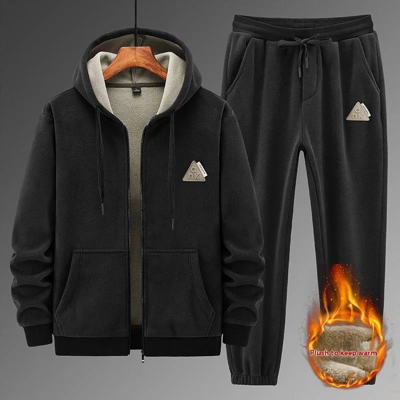 Grey casual sports suit set featuring a hooded long-sleeve sweater and matching trousers on a hanger.