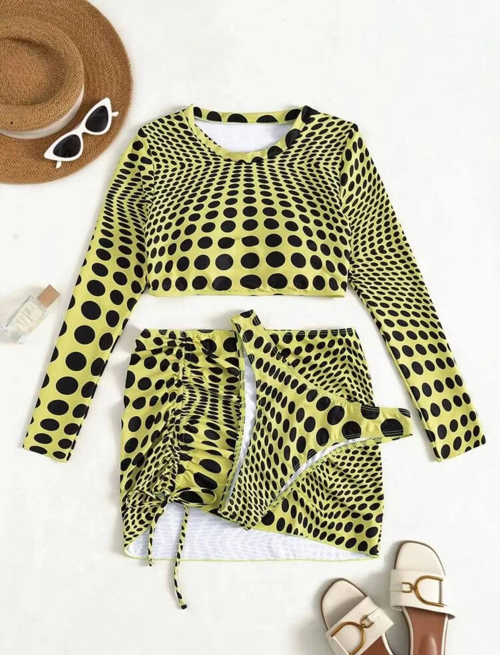 Women's green or yellow polka dot polyester swimsuit three-piece set with swim top, skirt, and bra