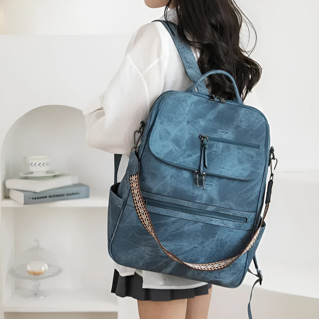 Retro PU leather unisex backpack with curved shoulder straps in solid colour options