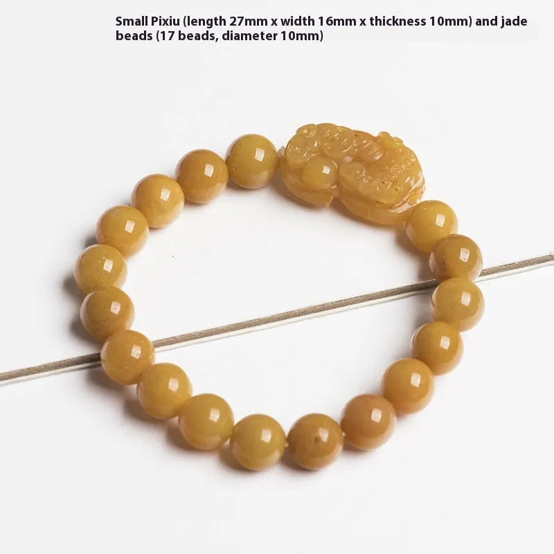 Hand-carved Golden Thread Jade money bracelet showing detailed coin design on round jade beads.