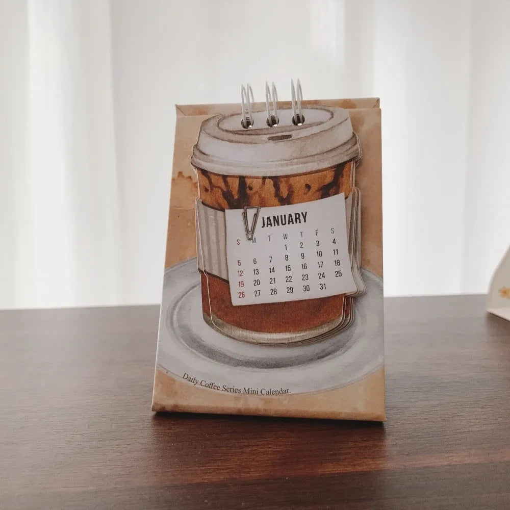 Mini 2025 desk calendar set showing four different themed designs including coffee and motivational messages.