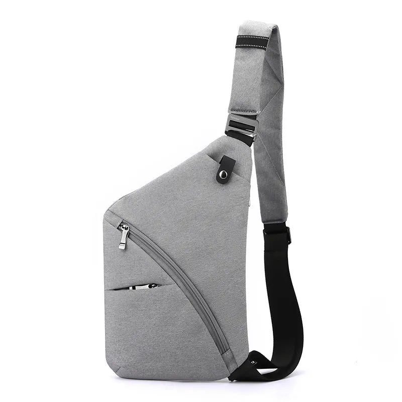 Men's black Oxford cloth chest bag worn on left shoulder with letter accent detail