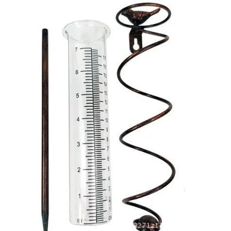 Cast iron hummingbird-shaped base holding glass rain measurement tube with 0-800ml scale