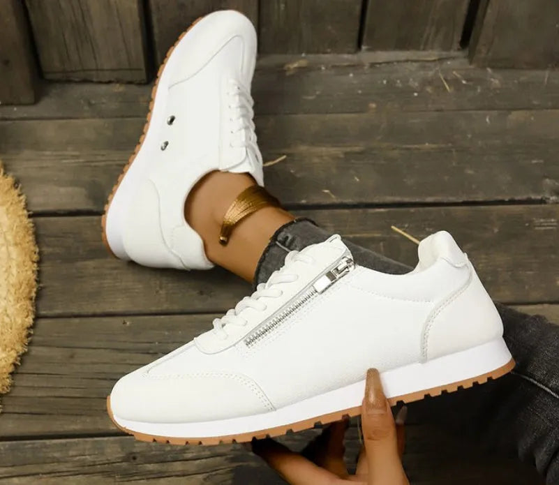 Women's flat-heeled shoes in grey, white, and champagne colours with rubber sole and PU upper