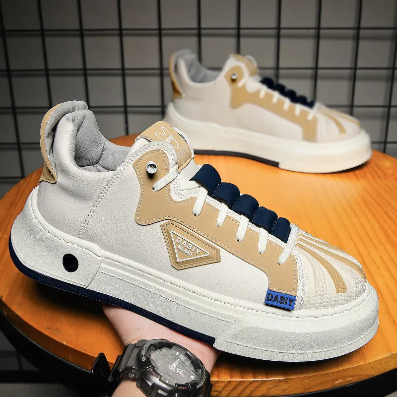Men's beige low-top casual sneakers with elastic band and leather stitching.