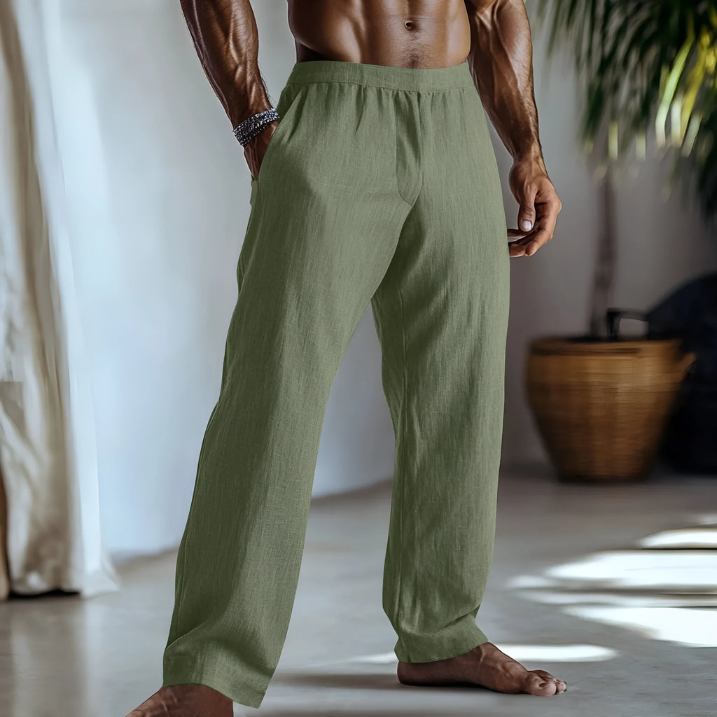 Straight-leg cotton and linen casual trousers in a light green colour, shown with visible pockets.