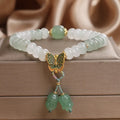 Green women's bracelet with Tian Shan Cui abacus beads and retro butterfly tassel design