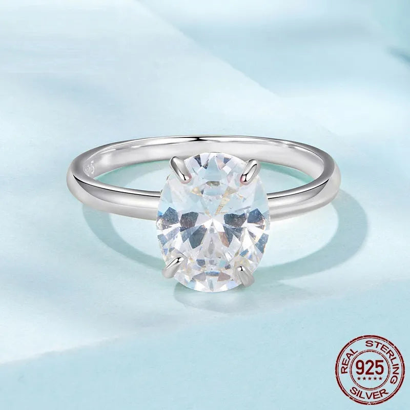 Oval cut 35 karat zircon engagement ring in silver with gold or silver electroplating, US sizes 6 to 8.