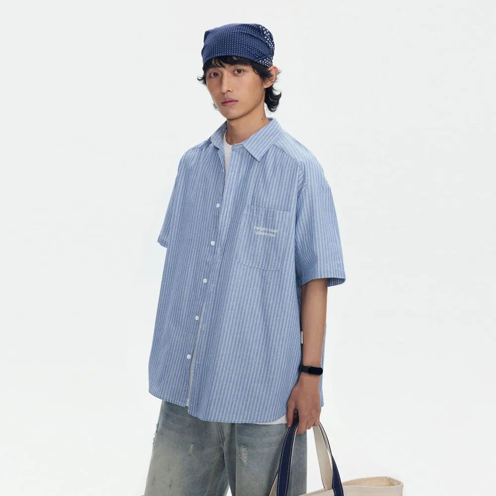 Blue striped short-sleeved shirt overalls with cardigan style on mannequin