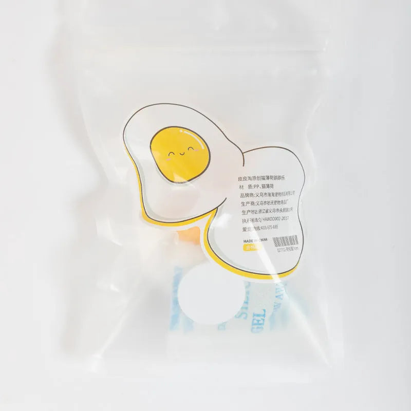 Interactive catnip ball toy in Fried Egg or Poached Egg style with soft plush exterior