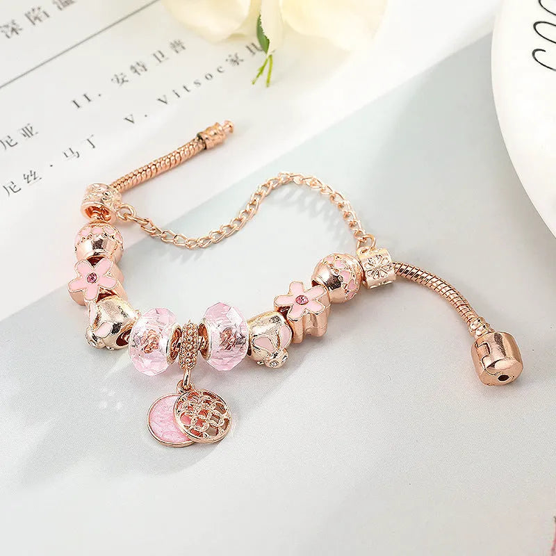 Rose gold geometric love bracelet on display with alloy plating finish
