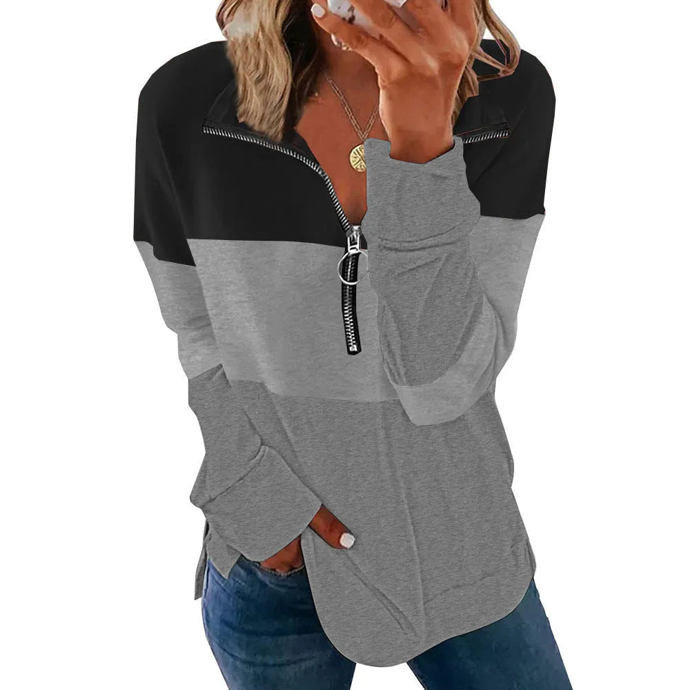 Women's loose long-sleeved leopard print pullover sweater in polyester on a hanger.