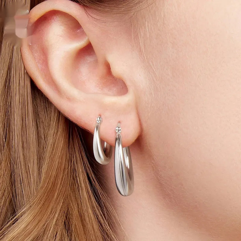 Geometric ring design ear clip earrings in copper alloy with silver needle fastening