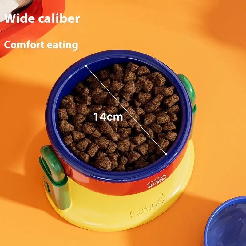 Suction cup cat bowl with adjustable lifting in pink on tile floor