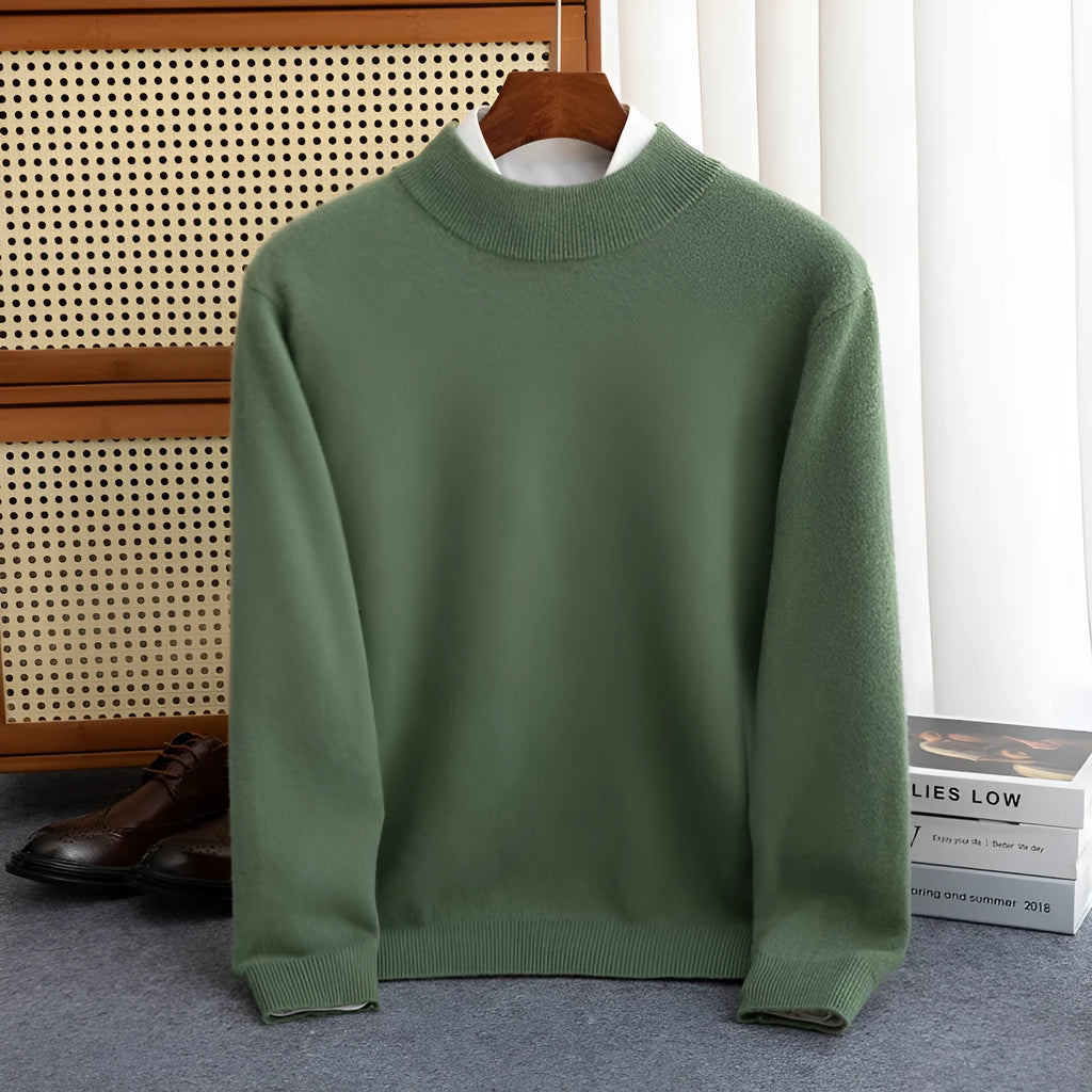 Man wearing a loose-fit half-collar wool sweater in a winter setting.