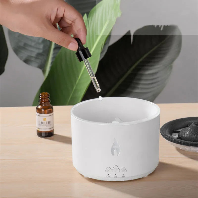 White round humidifier producing a two-colour blue and white volcanic spray ring of mist.