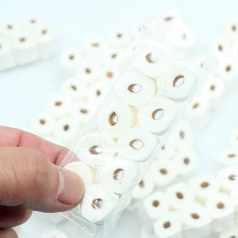 Simulated tissue roll paper toy model measuring 30x15x80mm for children's pretend play