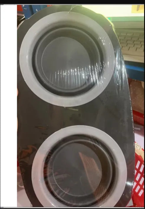 Folding pet double bowl in grey collapsed flat showing PP and TPR construction with two compartments