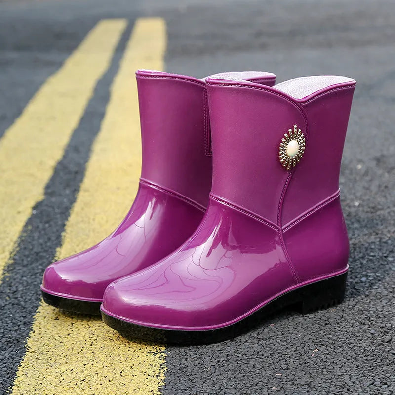 Women's purple PVC fashion rain boots with non-slip sole and low tube socks design
