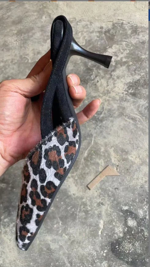 Leopard print suede women's sandals with pointed toe on a white background