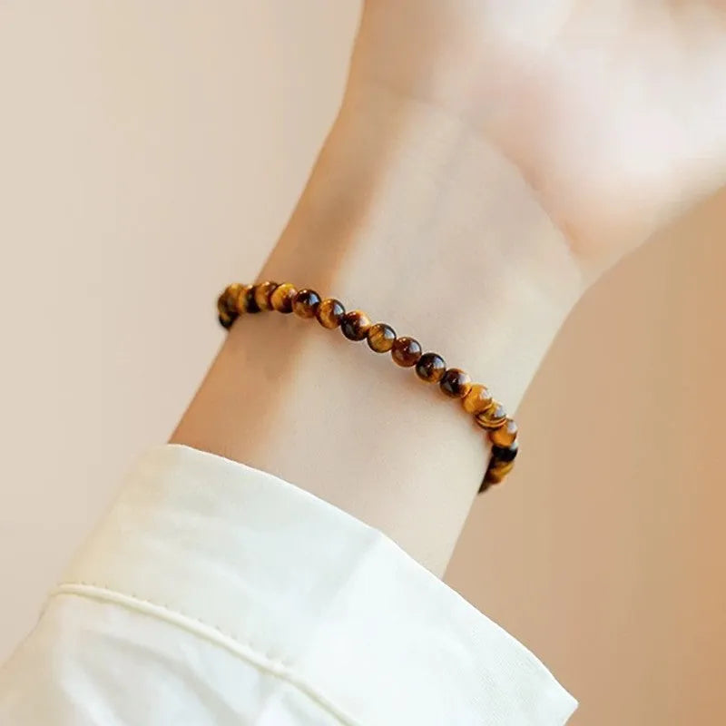 Tigereye stone bracelet with geometric design in New Chinese style showing round beads