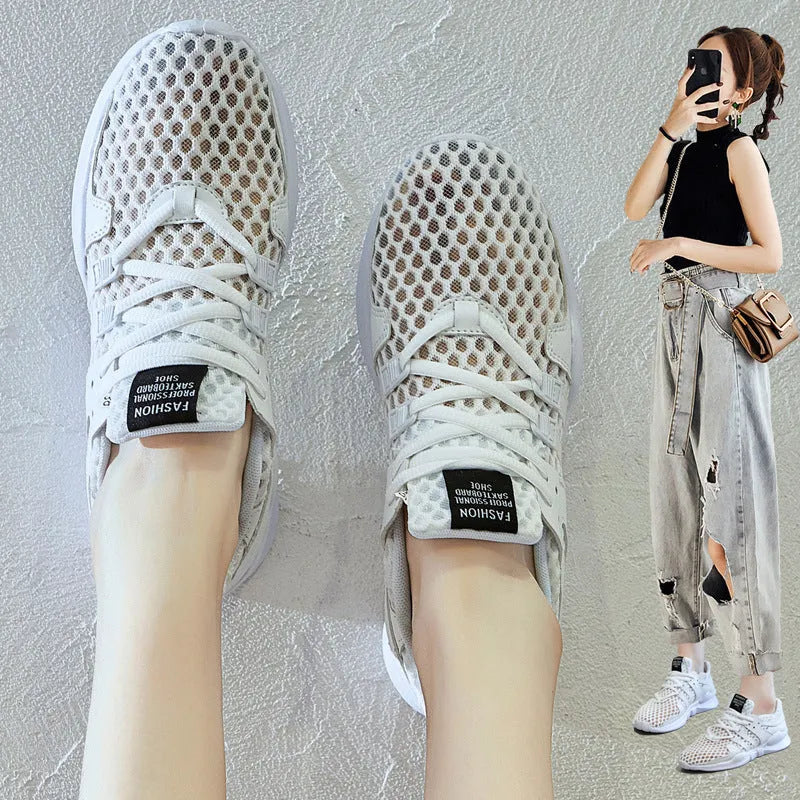 Casual mesh sneakers with hollow-out breathable design and round toe in black and white colour options