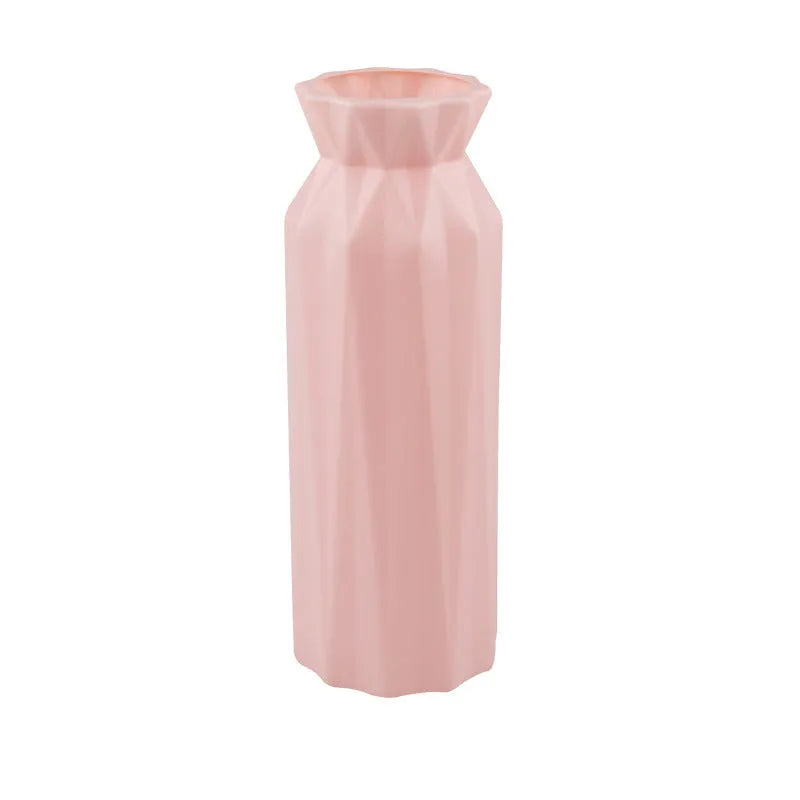 Green drop-resistant melamine plastic vase with 7.2cm base on a wooden desk.