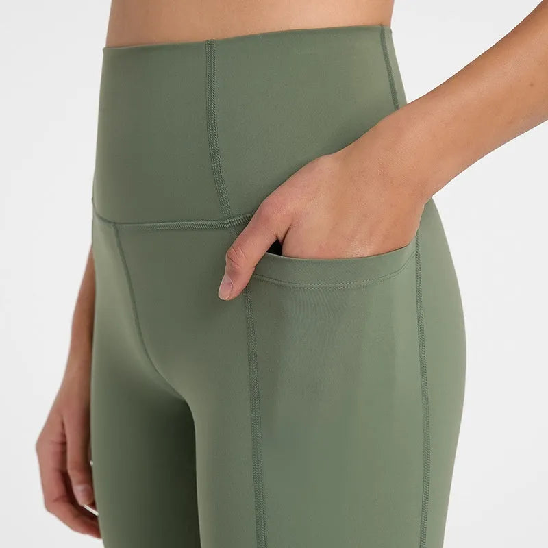 Women's short-length sports shorts in cotton blend fabric shown in black, for running and fitness activities.