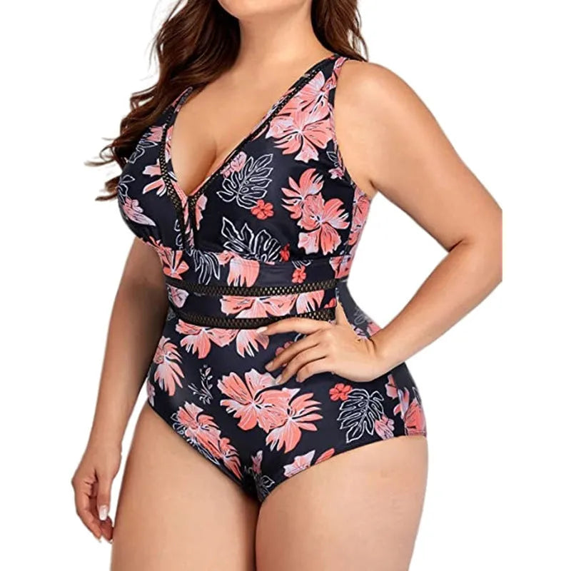 Women's black printed polyester plus-size bikini swimsuit shown on a hanger.