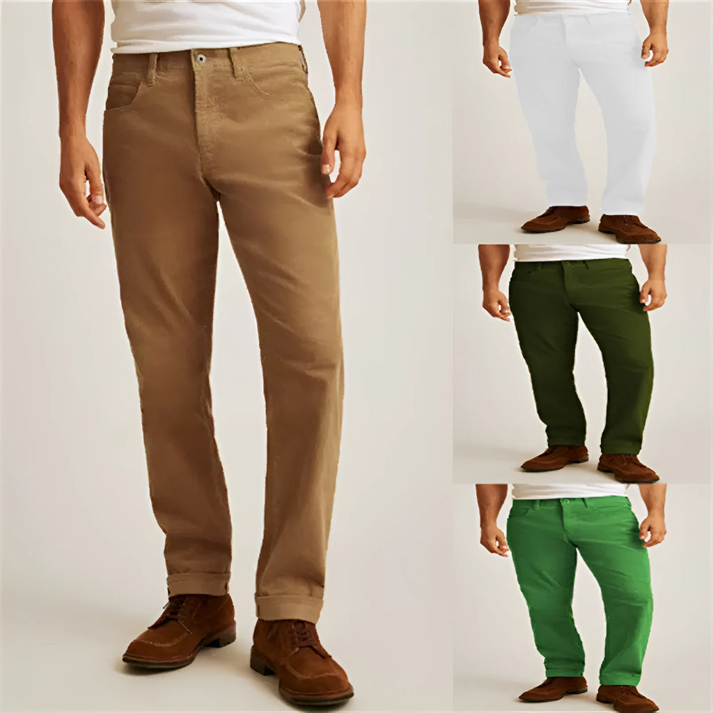 Man wearing loose fit straight-leg corduroy trousers in a solid colour.