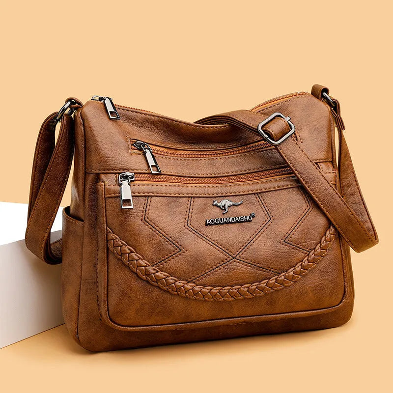 Soft PU leather shoulder bag with zippered compartments in horizontal square shape
