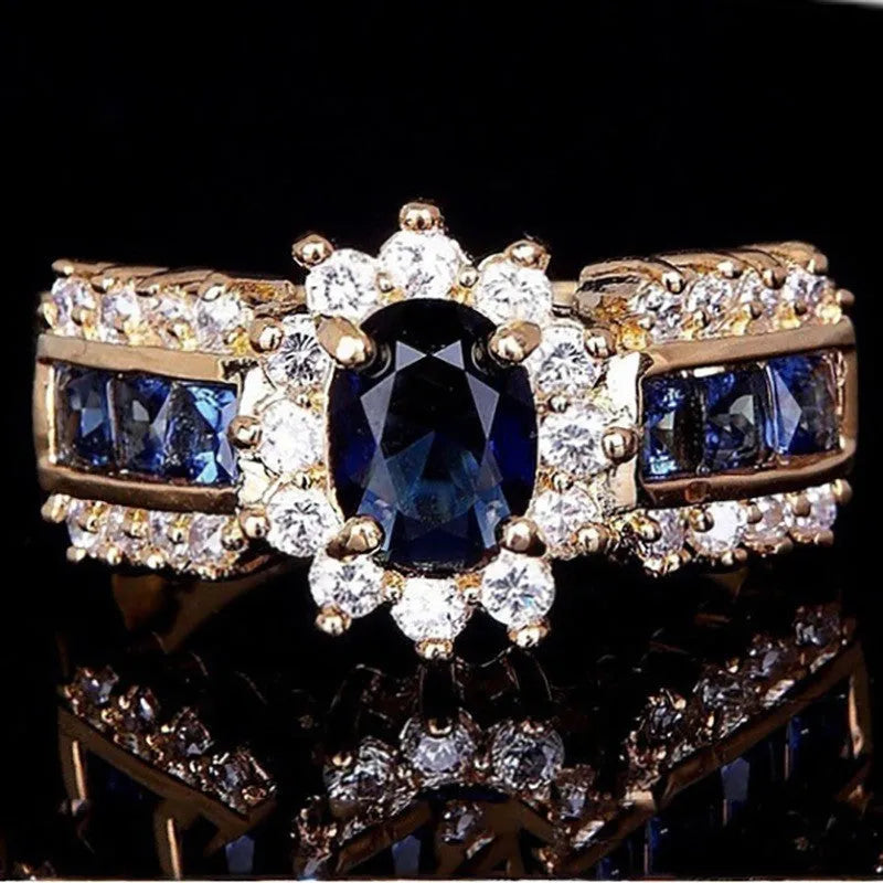 Personalised zinc alloy fashion ring with diamond or blue and purple zircon stone detailing.