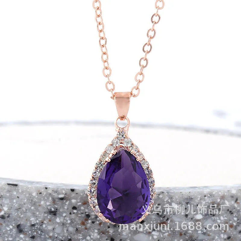 Women's geometric drop shape alloy necklace with rhinestone accents in rose gold pink colour